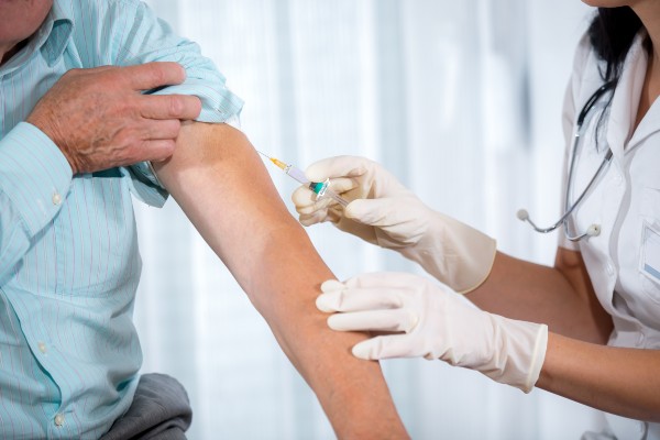 image of patient receiving covid vaccine